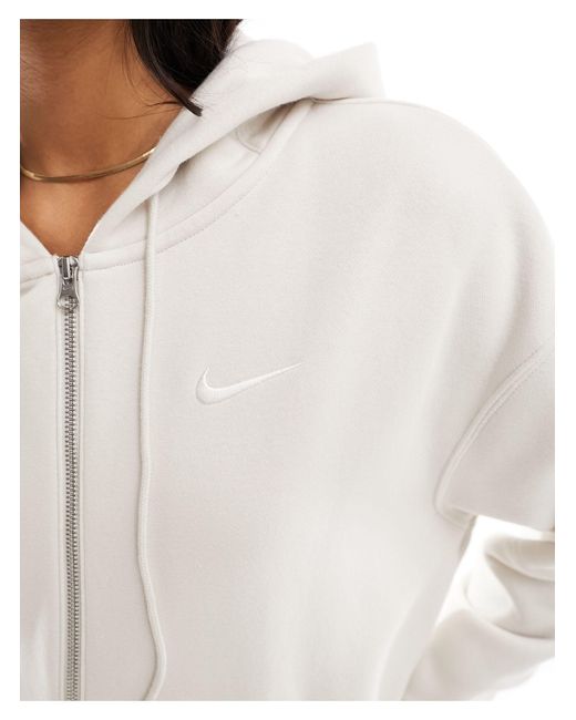 Sudadera marrón claro extragrande con capucha, cremallera y logo pequeño Nike de color White