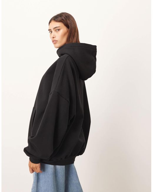 Sweat à capuche oversize épais ARRANGE en coloris Black