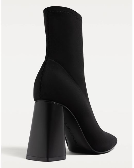 Bottines effet néoprène à talon haut Stradivarius en coloris Black
