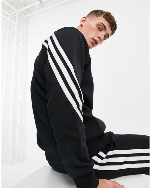Sudadera negra con tres rayas diagonales adidas Originals de hombre de  color Negro | Lyst