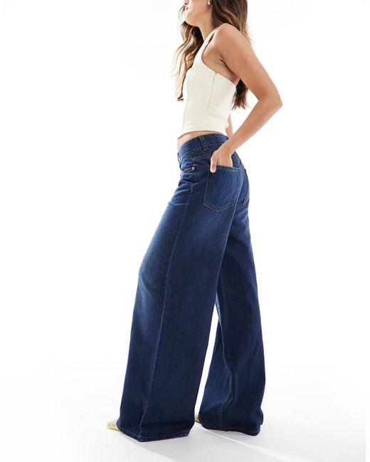 Jeans A Fondo Ampio Lavaggio Rinse Wash di ASOS in Blue