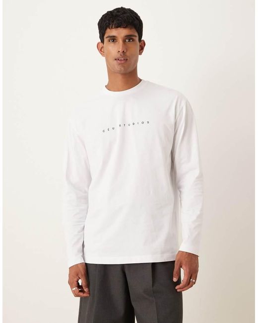 T-Shirt Comoda A Maniche Lunghe Bianca Con Stampa Di Stemma Sul Petto di ASOS in White da Uomo