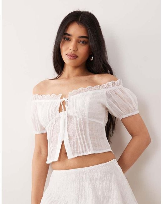 The Frolic White Exclusive Lace Trim Bardot Puff Sleeve Split Front Top Co-Ord