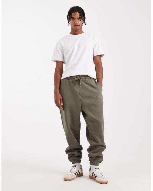 Joggers Caquis Holgados Básicos Essentials De -Verde ASOS de hombre de color Green