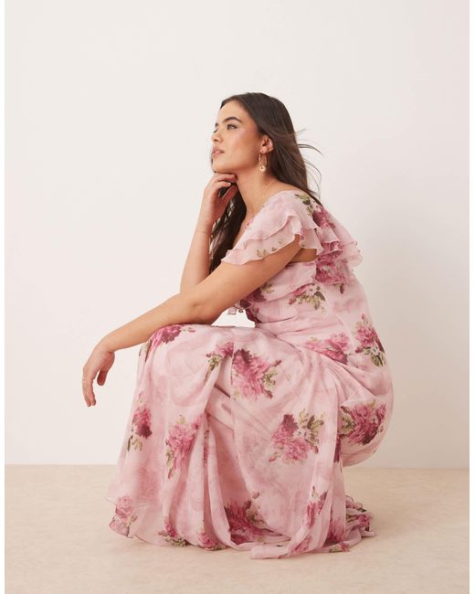 Asos design curve - robe longue à imprimé fleuri avec volants et manches évasées - rose ASOS en coloris Pink