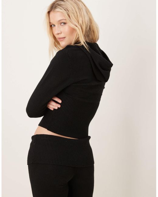 Gilet d'ensemble en maille à capuche et fermeture éclair à large ourlet côtelé Gina Tricot en coloris Black