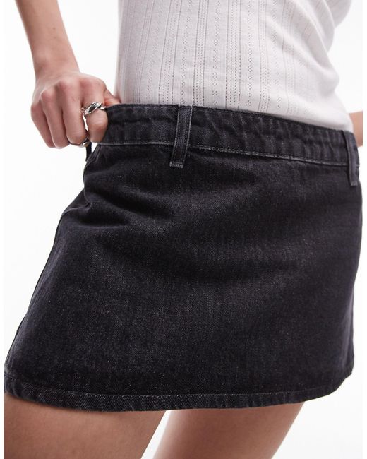 Jupe épurée ultra-courte en jean - délavé TOPSHOP en coloris Black