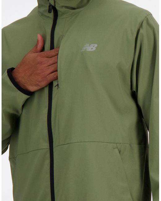 New Balance Green Stretch Woven Jacket for men