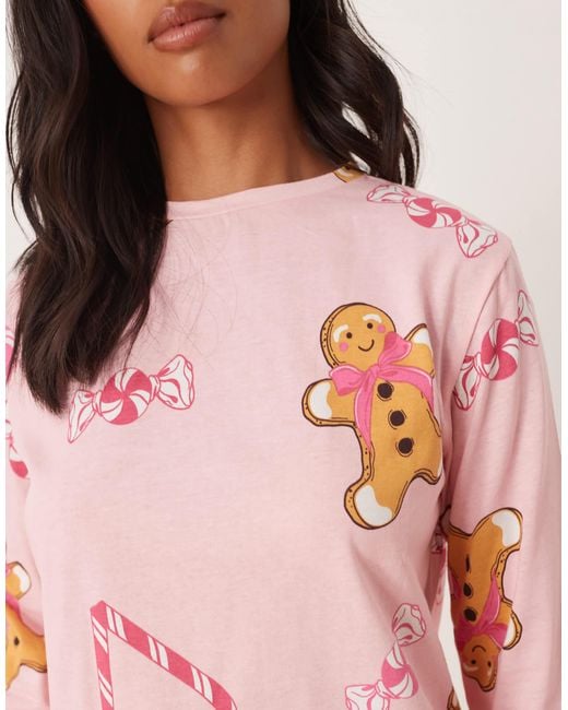 ASOS Pink Asos Design Petite Gingerbread & Candy Cane Long Sleeve Top & Trouser Pyjama Set