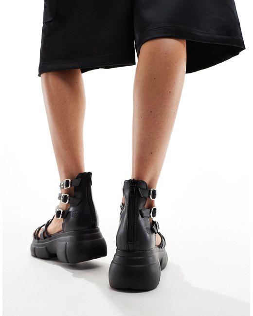 Koi - dark writings - sandales chunky à lanières Koi Footwear en coloris Black
