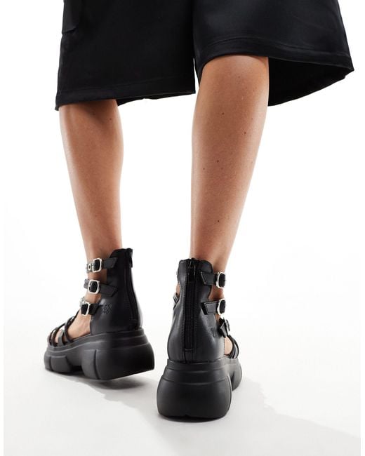 Sandalias negras con diseño Koi Footwear de color Black