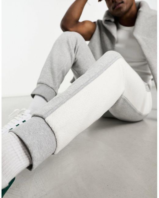 Adidas Originals White Essentials+ Small Logo Cut And Sew Trackies for men