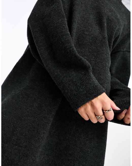 Exclusivité asos - - annie - robe pull courte en laine mélangée à col roulé - noir cassé chiné Weekday en coloris Black
