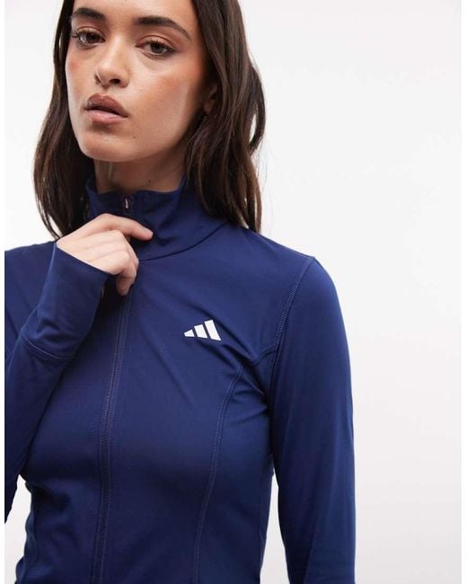 Adidas Originals Blue Three Stripes Studios Zip Thru Top