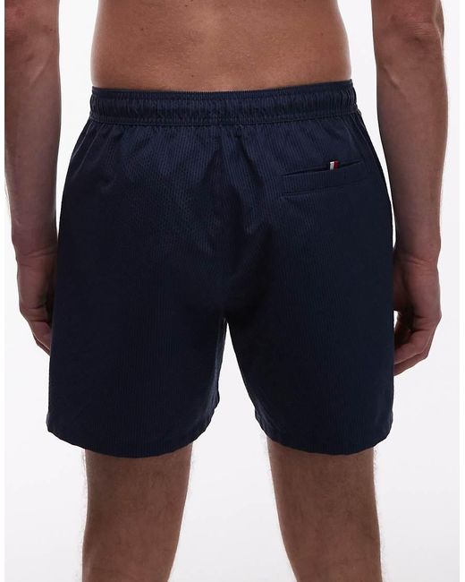 Tommy Hilfiger Blue Textured Drawstring Zip Swim Shorts for men