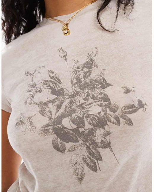 Camiseta Color Topo Con Diseño Encogido Y Estampado Gráfico Floral De Devoré De -Beis Neutro ASOS de color Blue