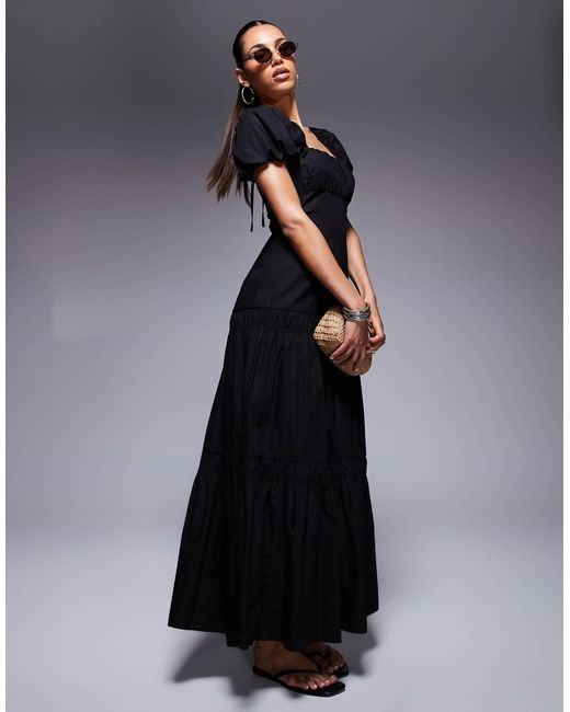 Robe tendance folk mi-longue à manches bouffantes River Island en coloris Black