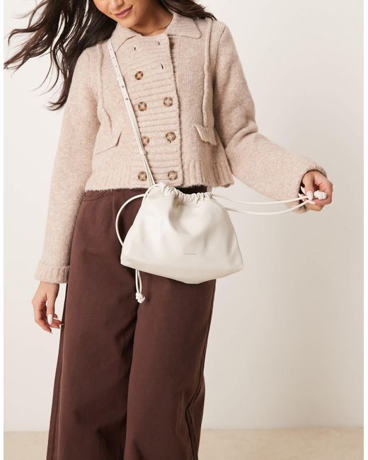 Calvin Klein Natural Drawstring Crossbody Bag