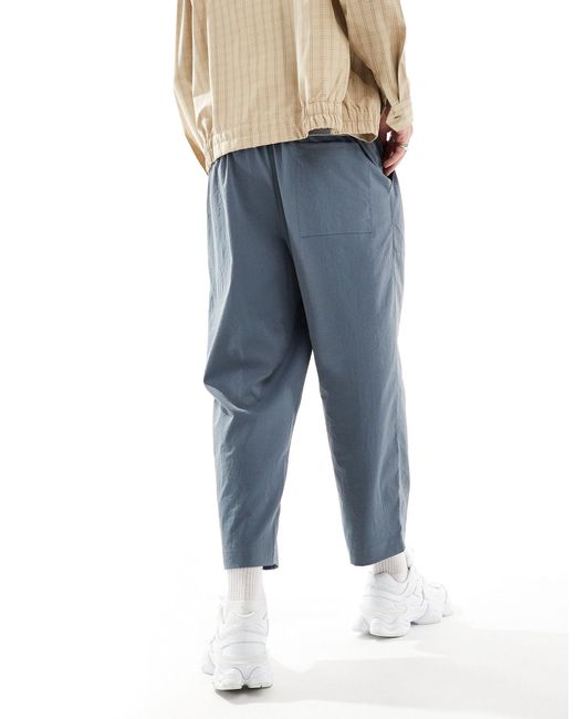 Pantaloni cropped comodi a fondo ampio blu di Reclaimed (vintage) in Blue da Uomo