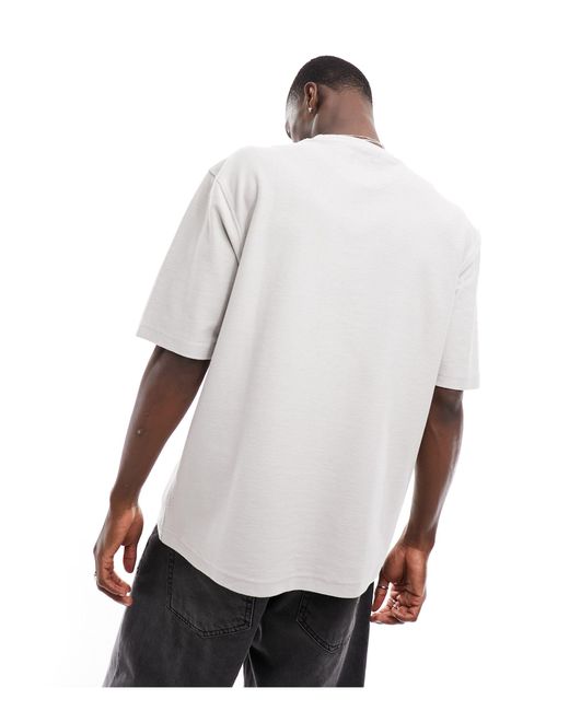 T-shirt oversize testurizzata chiaro di Another Influence in White da Uomo
