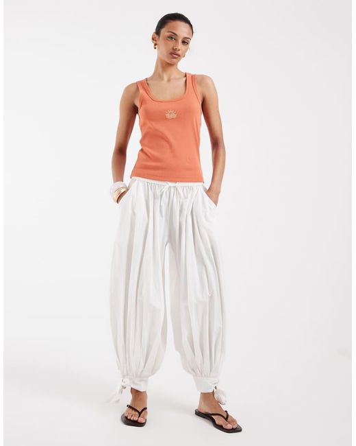 Vero Moda Orange Scoop Neck Ribbed Singlet With Sun Embroidered Graphic