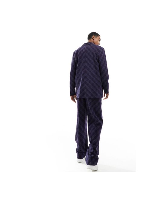 Pantaloni da abito a quadri a fondo ampio con taglio sbieco di ASOS in Blue da Uomo