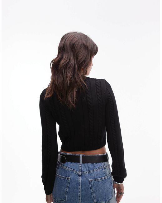 Pull en maille torsadée Tommy Hilfiger en coloris Black