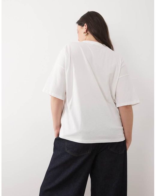 Never Fully Dressed White Cotton Banana Front Print T-shirt