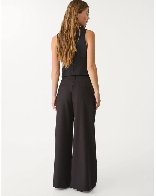 Pantalon ultra large à taille ajustable Stradivarius en coloris Black