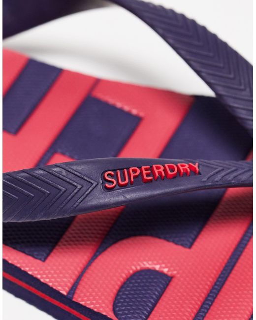 Superdry – vegane vintage-zehenstegsandalen in Pink für Herren