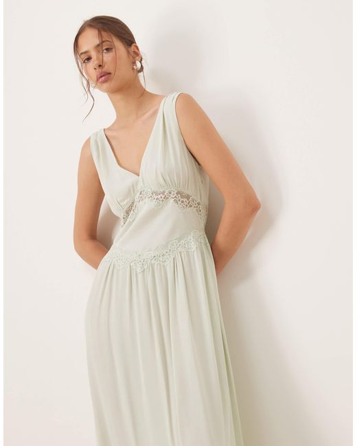 Robe mi-longue avec col v et détail en dentelle - pâle Mango en coloris Natural