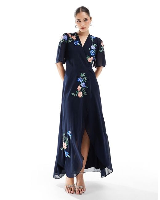 Hope & Ivy Embroidered Flutter Sleeve Maxi Wrap Dress With Tie Waist in  Blue | Lyst