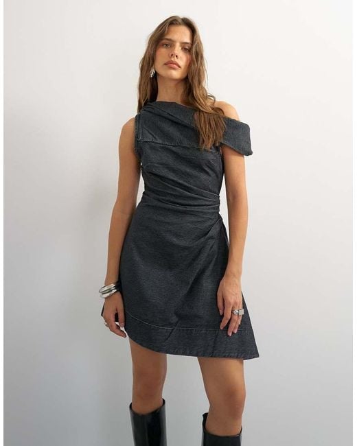 TOPSHOP Black X Cara Denim Asymmetric Off Shoulder Mini Dress