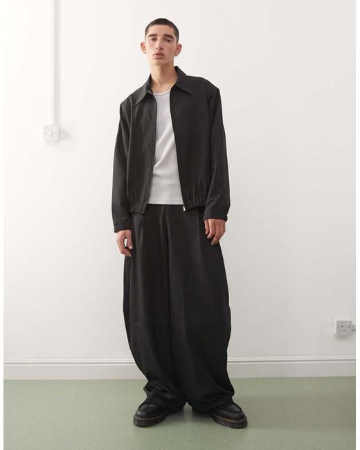 Collusion Black Tailored Pull On Balloon Trouser for men