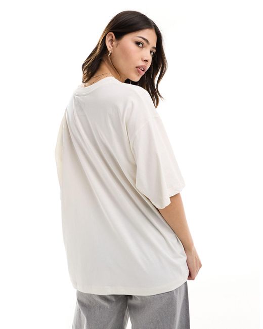 T-shirt oversize crema con grafica "olivia rodrigo" su licenza di ASOS in White
