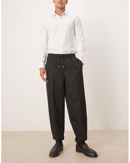 ASOS Black Tapered Fit Trouser With Elasticated Waist And Cuffs for men