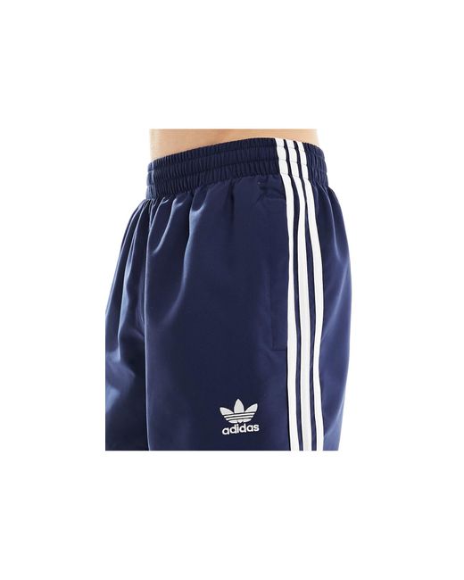 Pantaloncini da bagno con tre strisce e trifoglio di Adidas Originals in Blue da Uomo