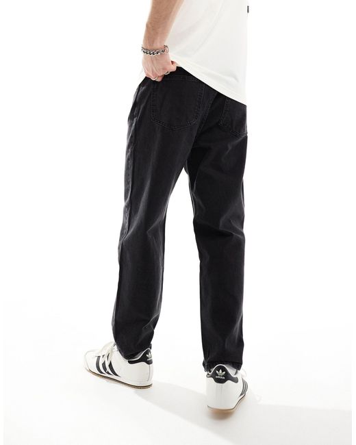Bershka – locker geschnittene jeans in Black für Herren