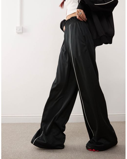 Monki Black Wide Leg Pull On Track Pant With Front Stripe