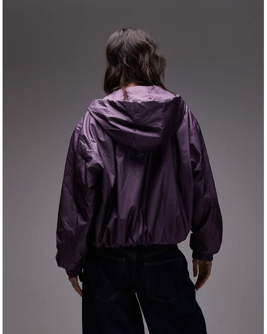 Chaqueta Bomber Morado Metalizado Impermeable Y Aislante Con Capucha 17290 Lohja De Rains de color Purple