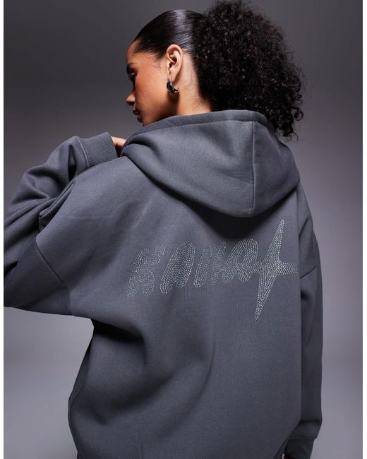 Sweat à capuche d'ensemble zippé en coton majoritaire à logo orné Kaiia en coloris Blue