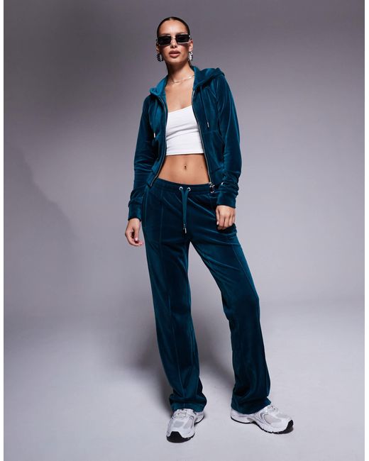 Exclusivité asos - sweat à capuche zippé d'ensemble en velours - sarcelle intense Juicy Couture en coloris Blue