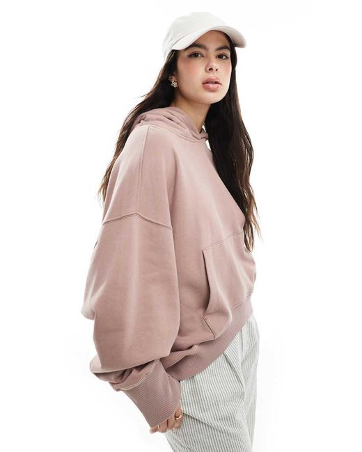 Felpa Con Cappuccio Oversize Con Fondo Asimmetrico Polvere Slavato di ASOS in Pink
