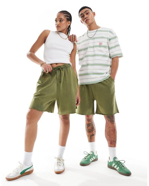 Pantaloncini oversize unisex kaki slavato di ASOS in Green