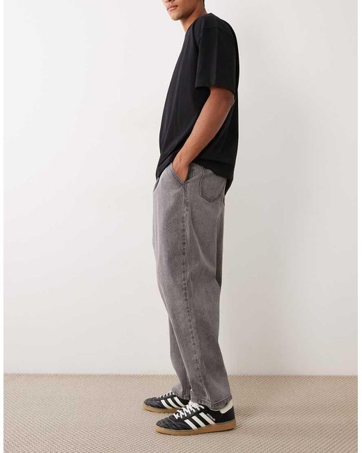 ASOS Black Relaxed Tapered Jeans for men