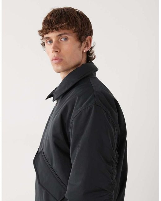 Chaqueta Bomber Negra Extragrande Con Cuello De Solapas De Weekday de hombre de color Black