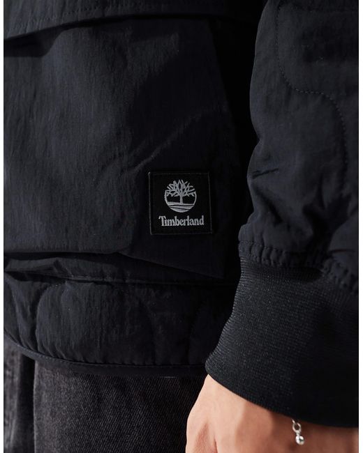 Timberland – wasserabweisende, gesteppte bomberjacke in Blue für Herren