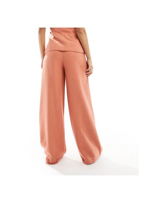 Pantaloni a fondo ampio color ruggine testurizzati con allacciatura con perline di ASOS in White