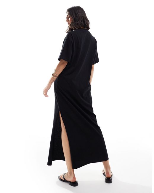 Robe t-shirt longueur mollet oversize ASOS en coloris Black
