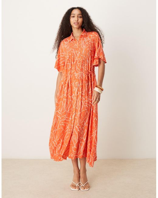 Robe boutonnée devant à ceinture et manches évasées - orange fleuri Y.A.S